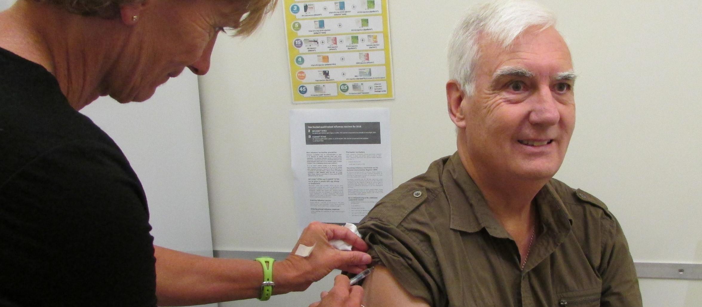 flu vaccine 2019, Kevin Saunders gets his annual influenza immunisation from nurse Kristine Reid [photo: supplied]