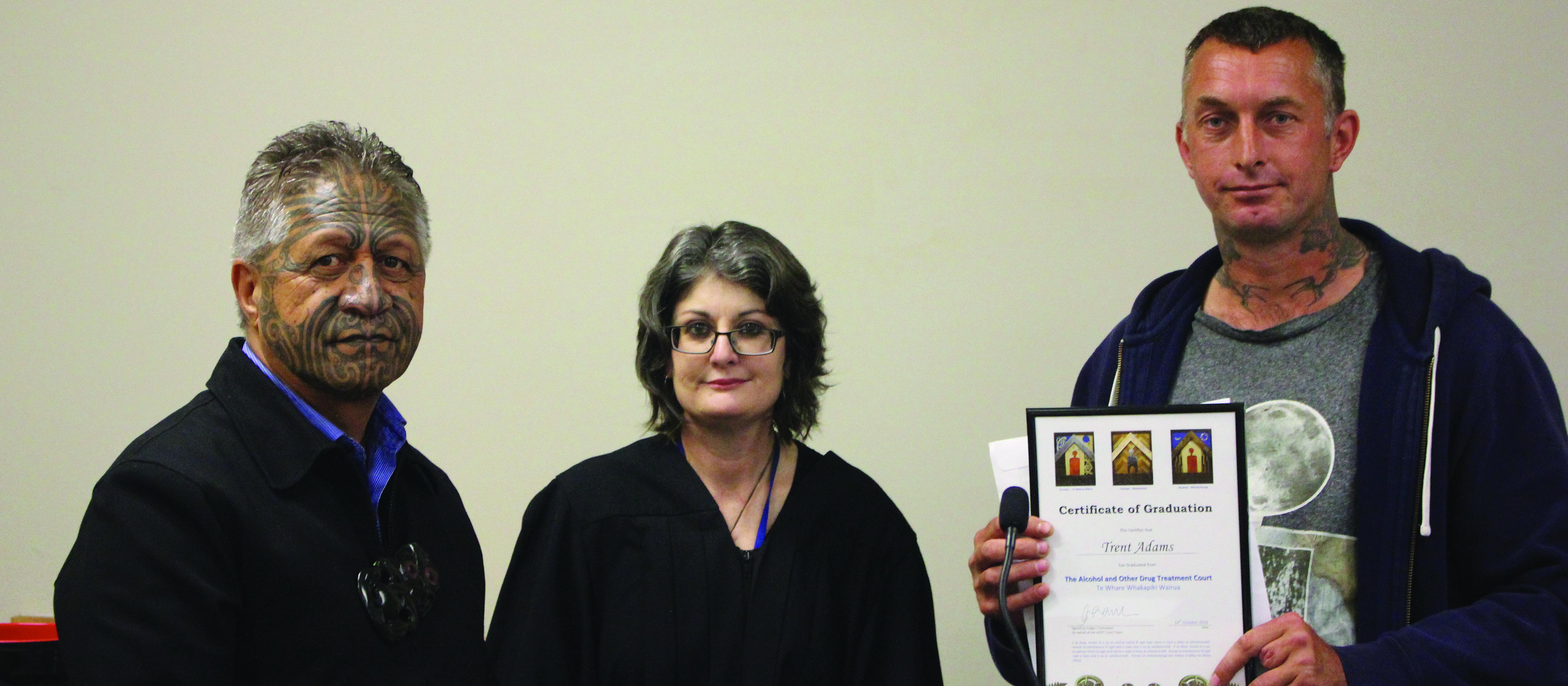 The court’s pou oranga (Māori spiritual adviser) Rawiri Pene, Judge Lisa Tremewan and Trent Adams, a graduate of the Alcohol and Other Drugs Court last year