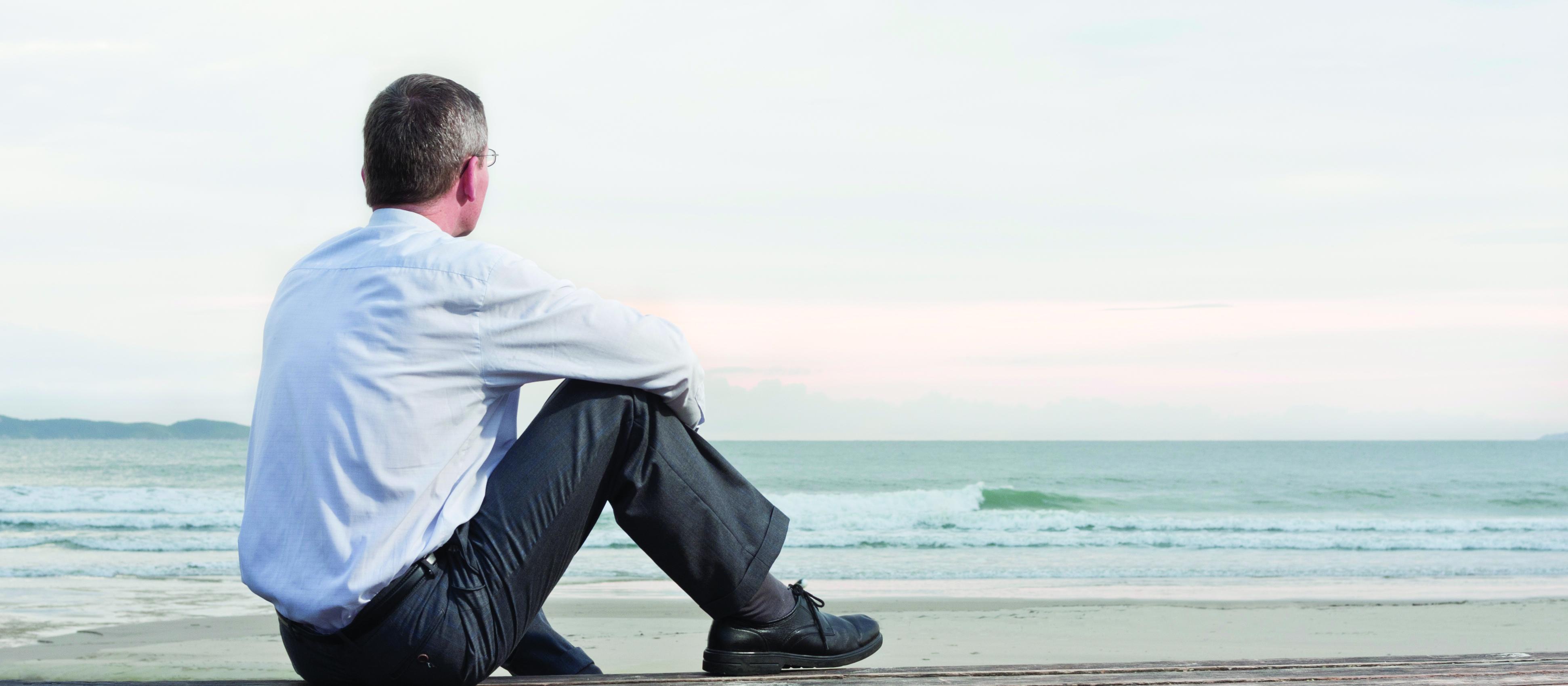 Man ponders waves