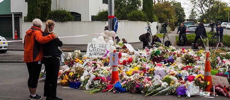 Women leaving flowers for Christchurch mosque shootings victims near the Al Noor Mosque 