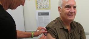 0416 Kevin Saunders gets his annual influenza immunisation from nurse Kristine Reid