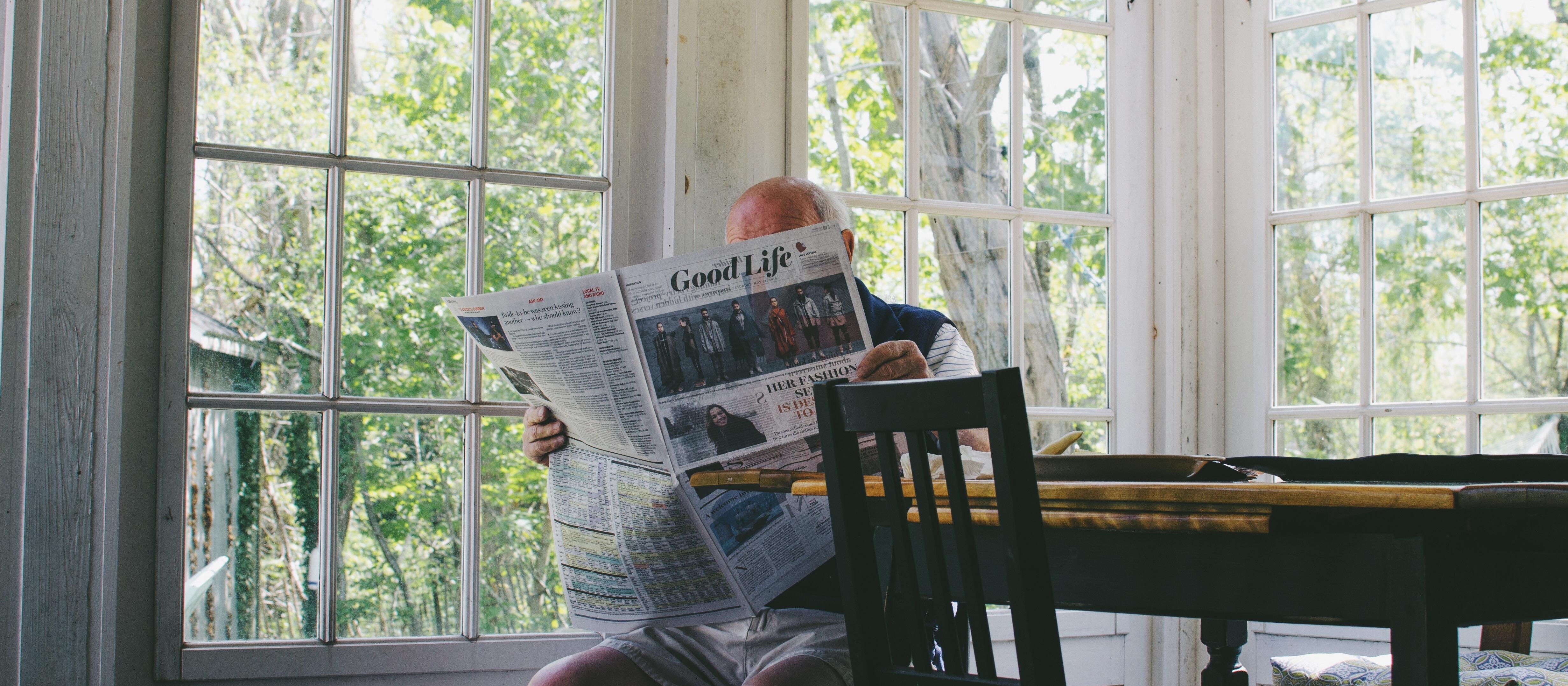 Newspaper reader