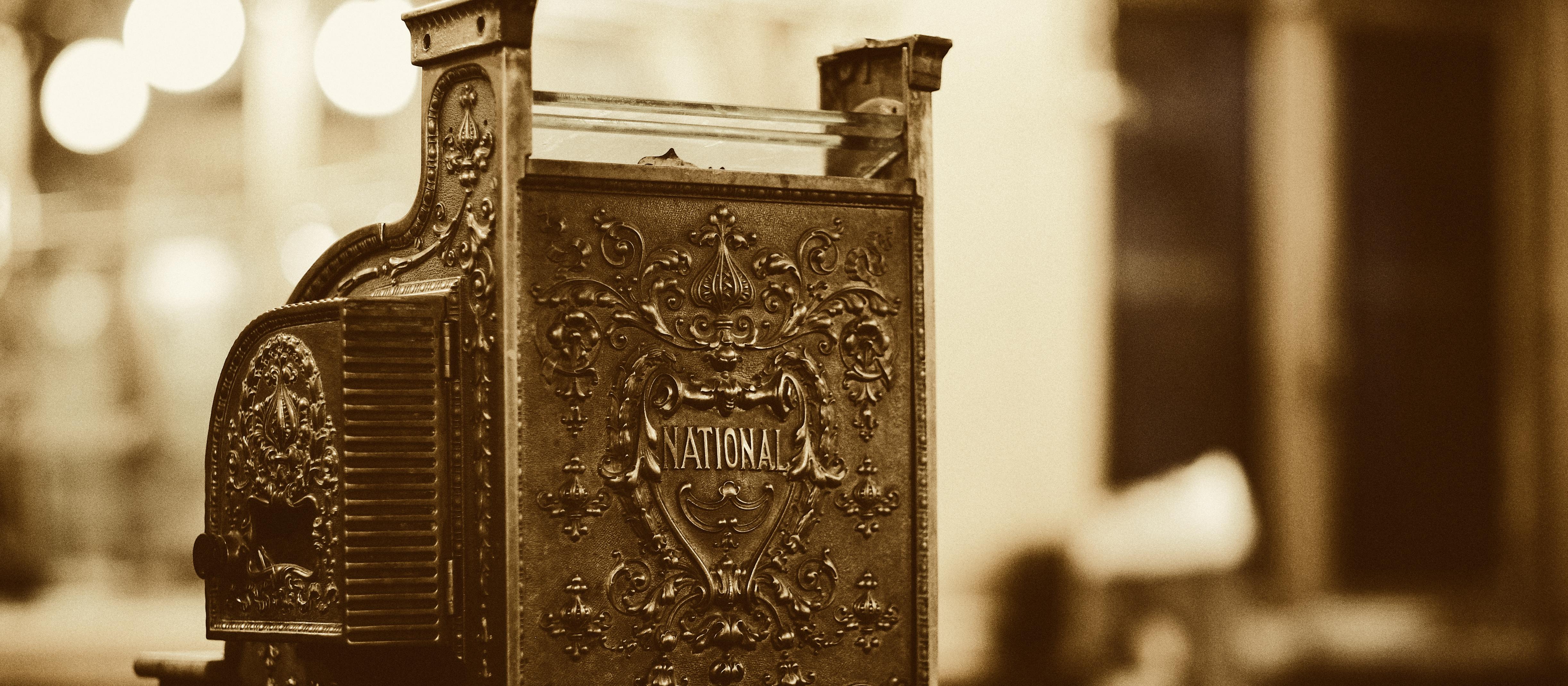 CASH REGISTER BY AGE BARROS, UNSPLASH, sepia