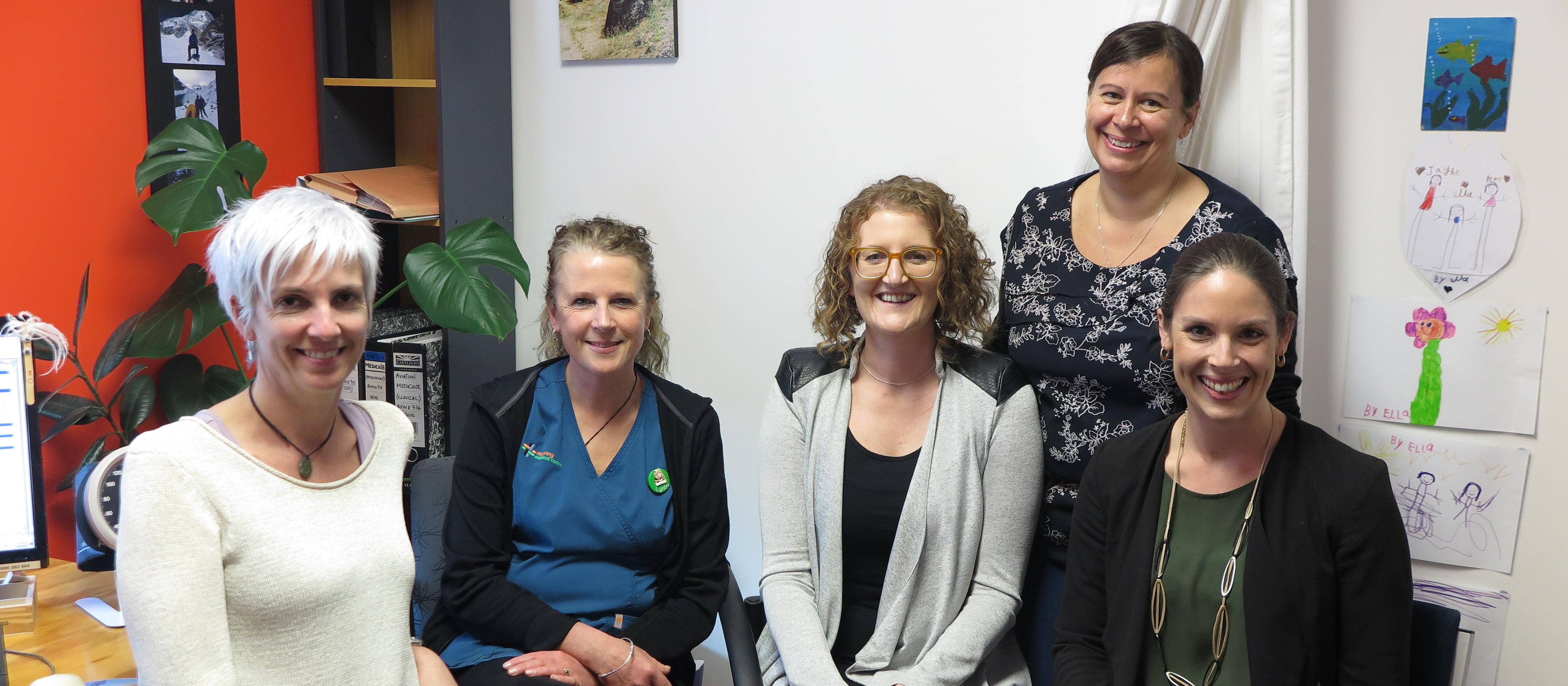 Some members of Wanaka’s Aspiring Medical Centre team gather for an HCH meeting: Jayne Davies (GP), Lynda Davis (nurse manager), Caroline Stark (general manager), Carolyn McKenzie (standing, GP) and Annelies Visser (operations manager)