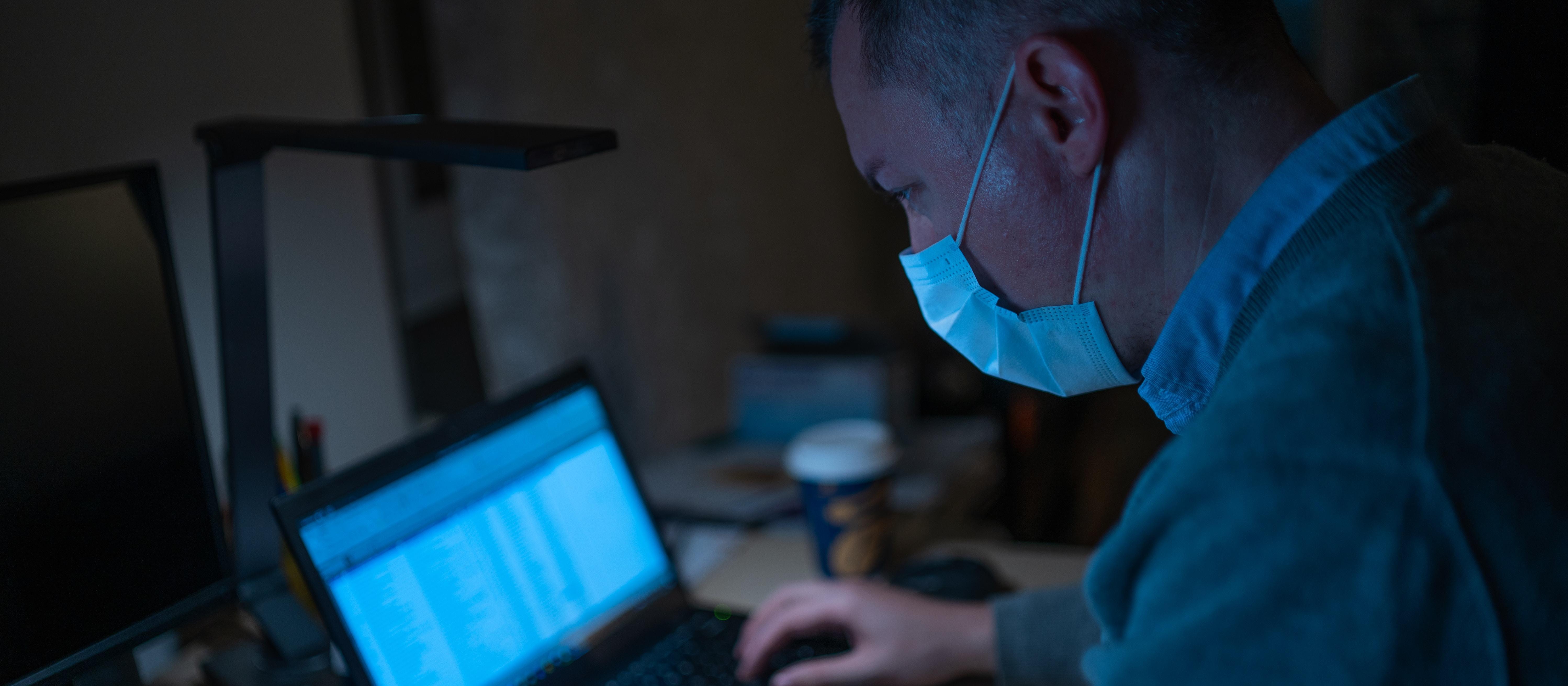 Mask wearing health professional. Photo by Dimitri Karastelev on Unsplash