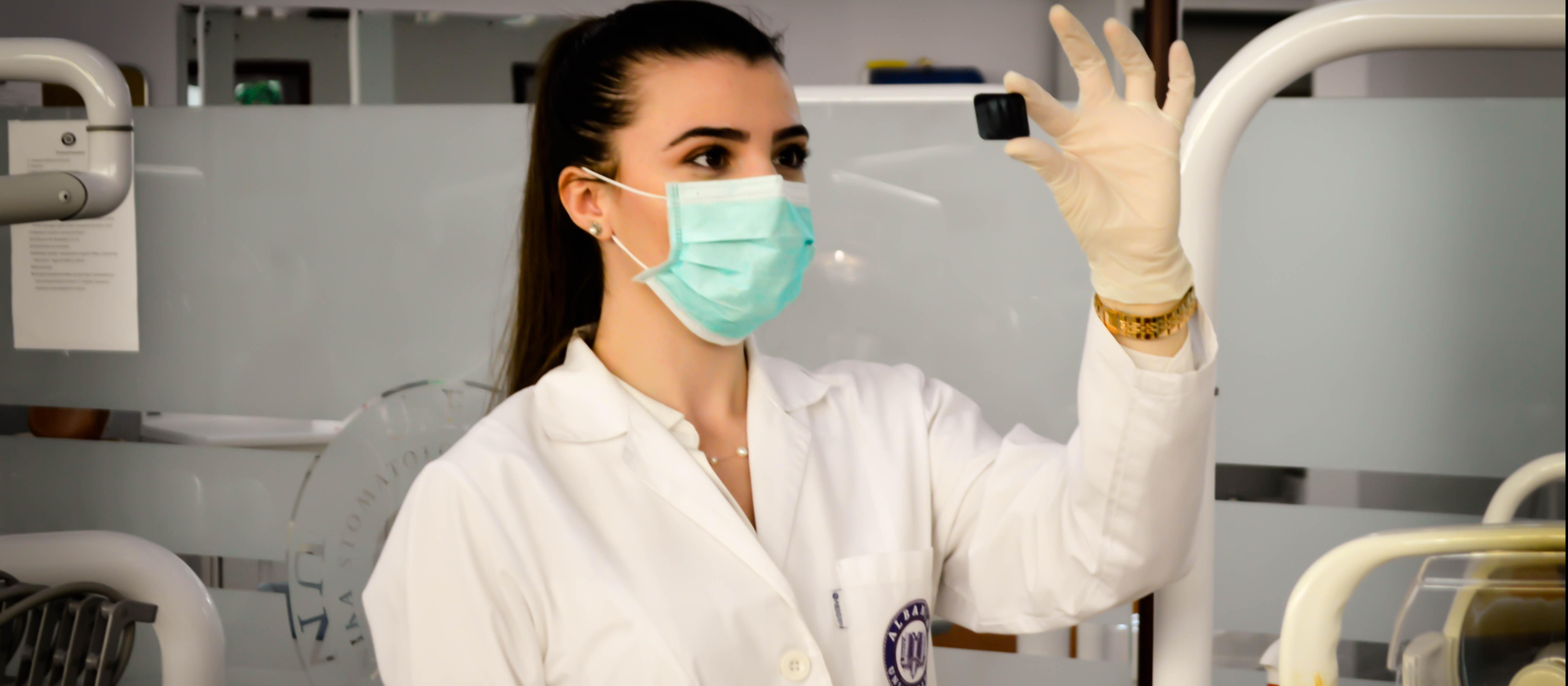 Scientist in lab wearing mask