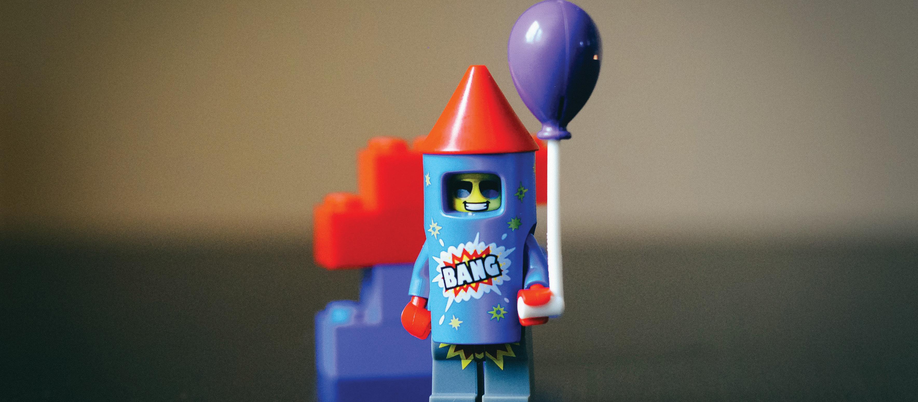 Lego man, balloon, bang