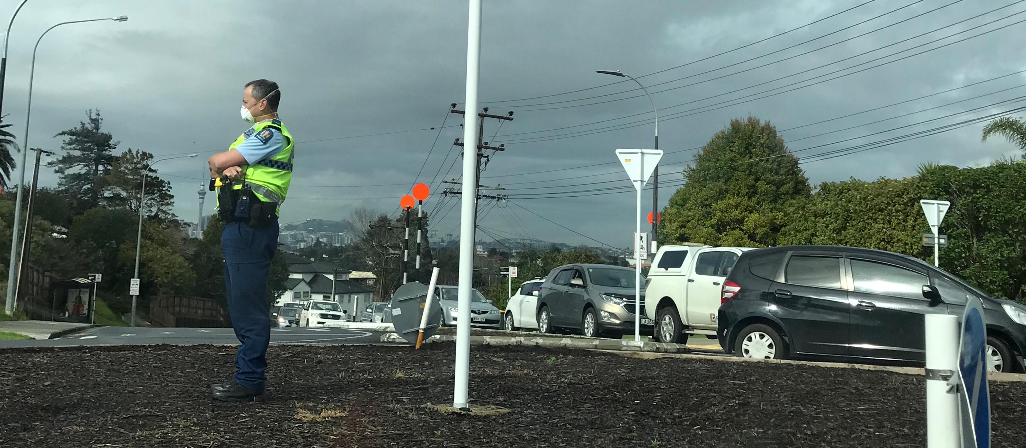 Police officer near Northcote covid testing station, pic by Anna Lee