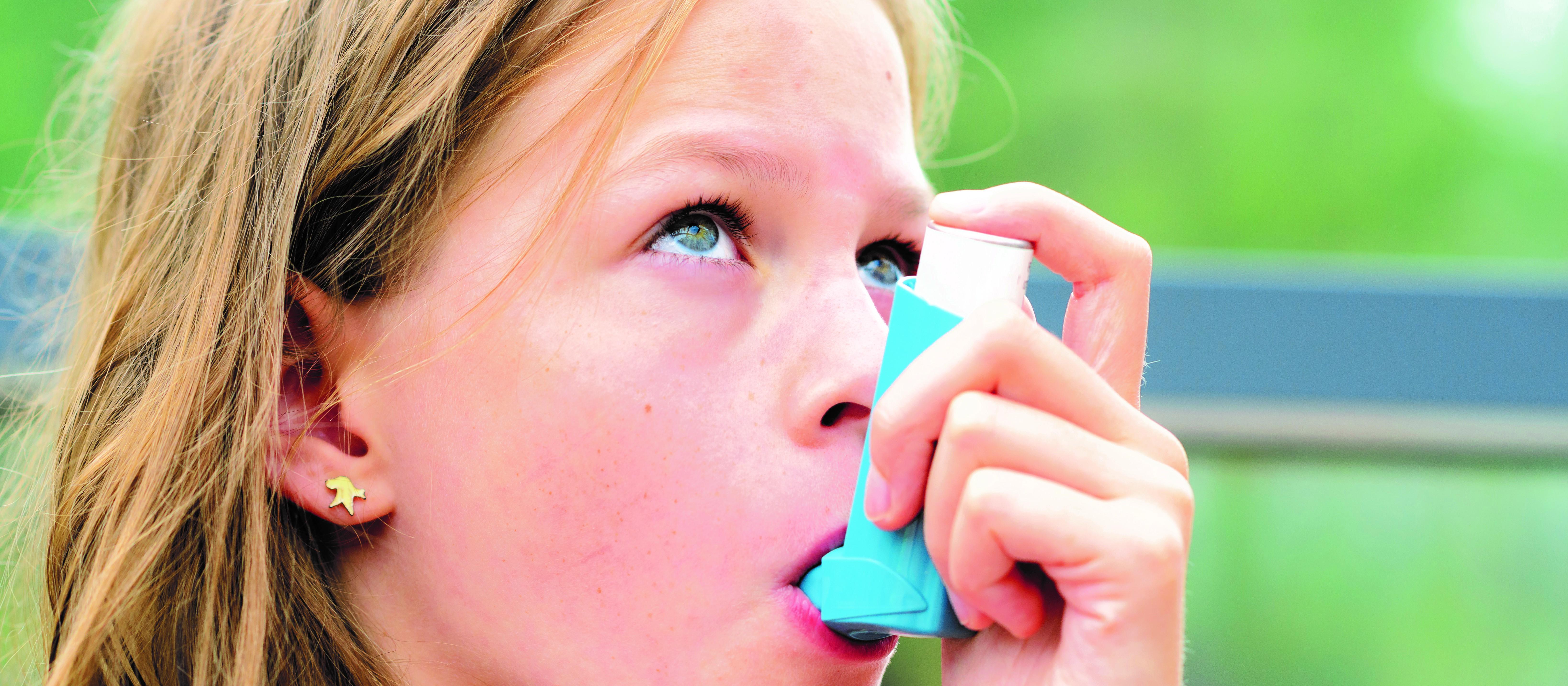 Girl using a inhaler, inhaler, asthma