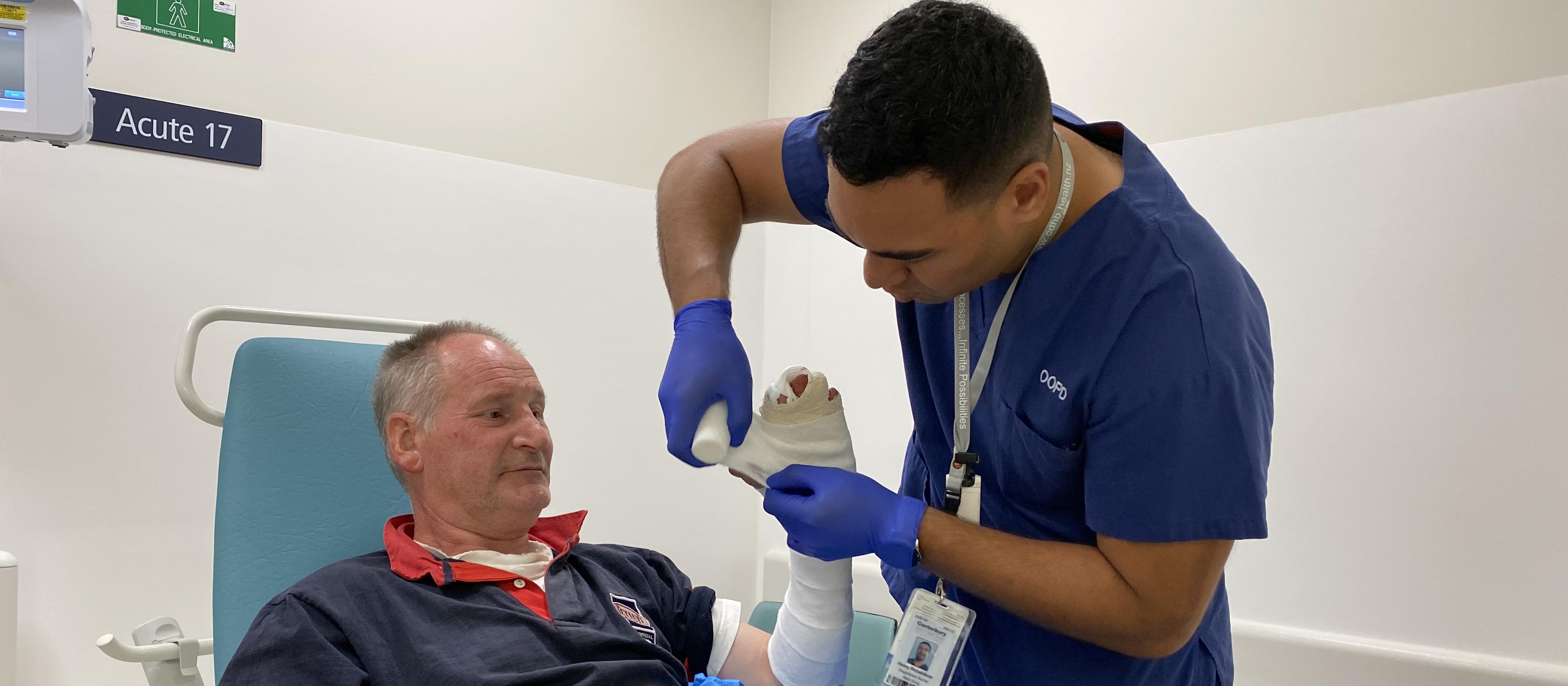 Matthew being treated by acute care nurse Henry Richardson