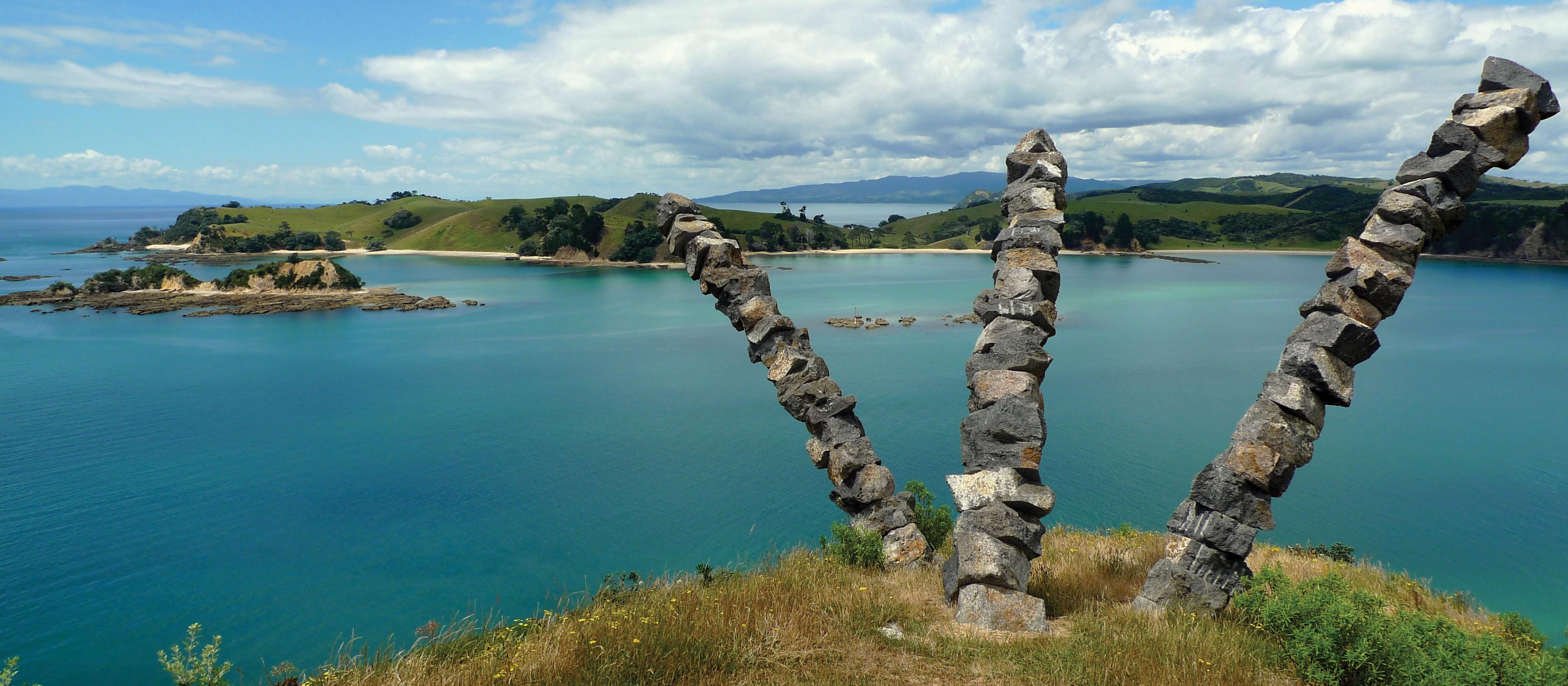 Rocks, rocks by the water. Photo by Andrea Carboni on Unsplash