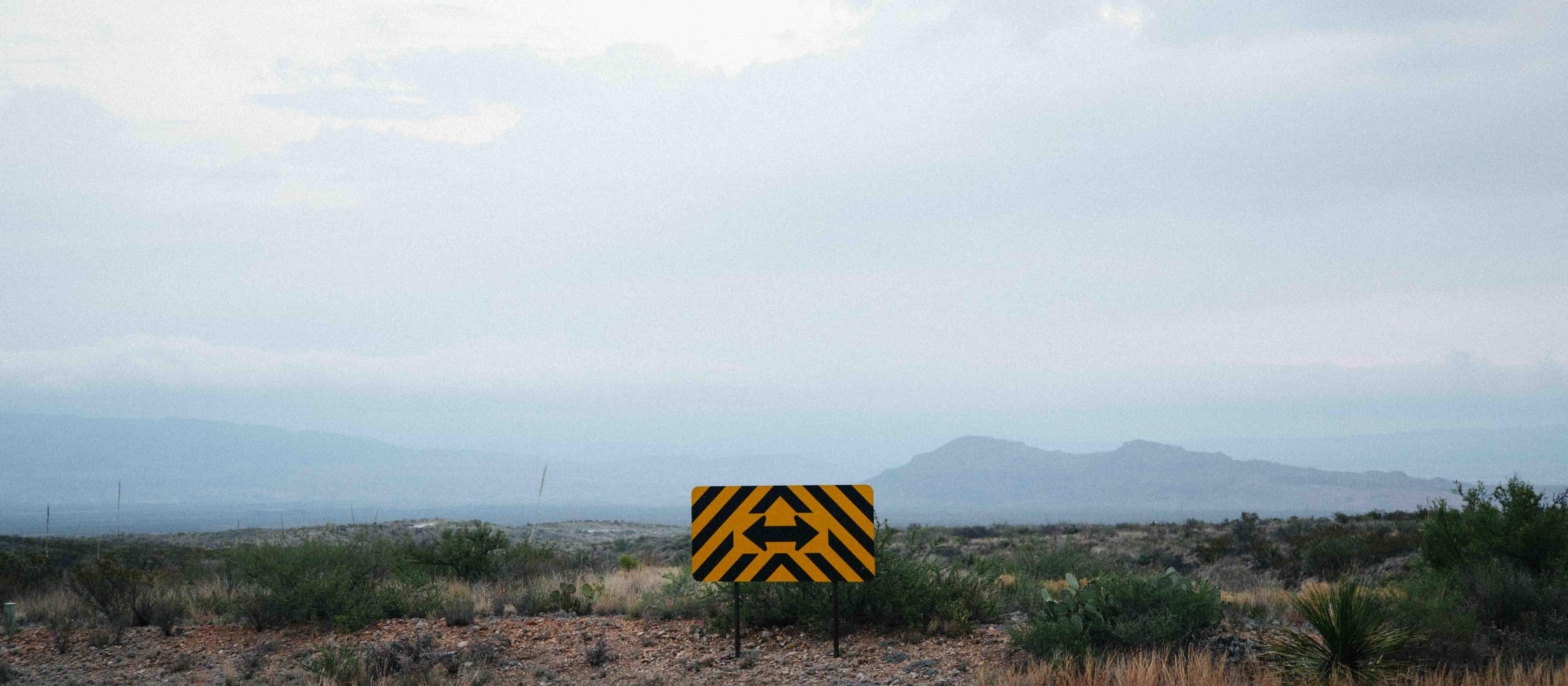 Indecision, road, two directions [Kylie Glenn/Unsplash]