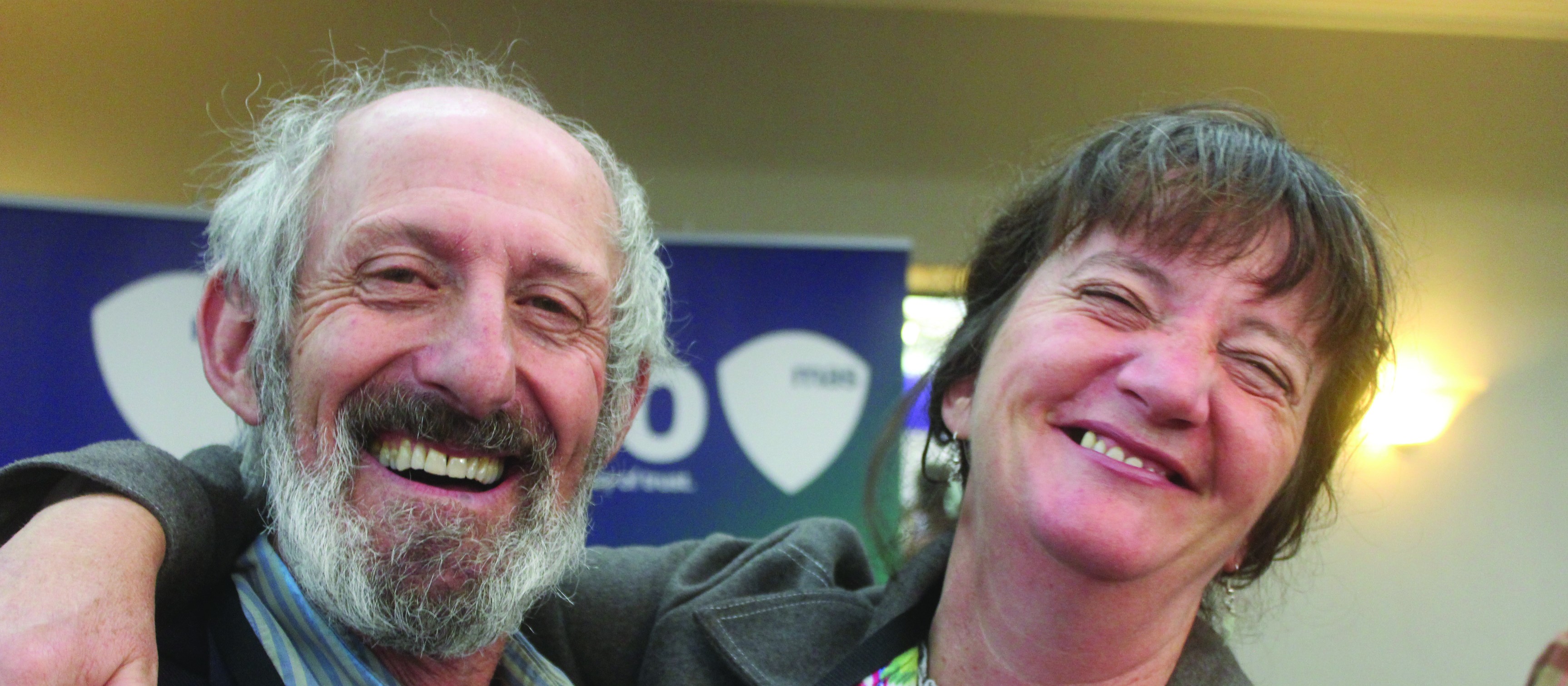 Martin London and Fiona Bolden hugging at the National Rural Health Conference 2021