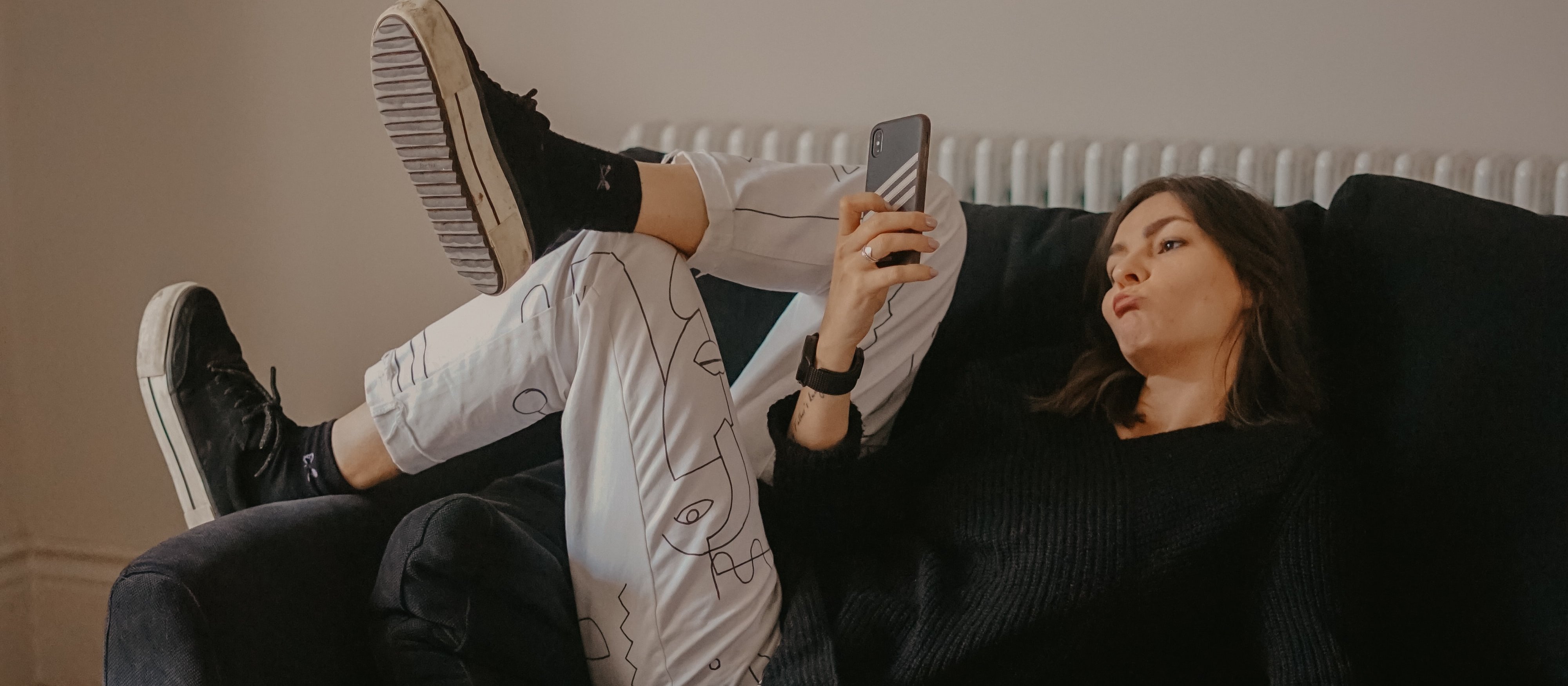 Staying at home, Self-isolation, Girl sitting on a couch_ Toa Heftiba on Unsplash