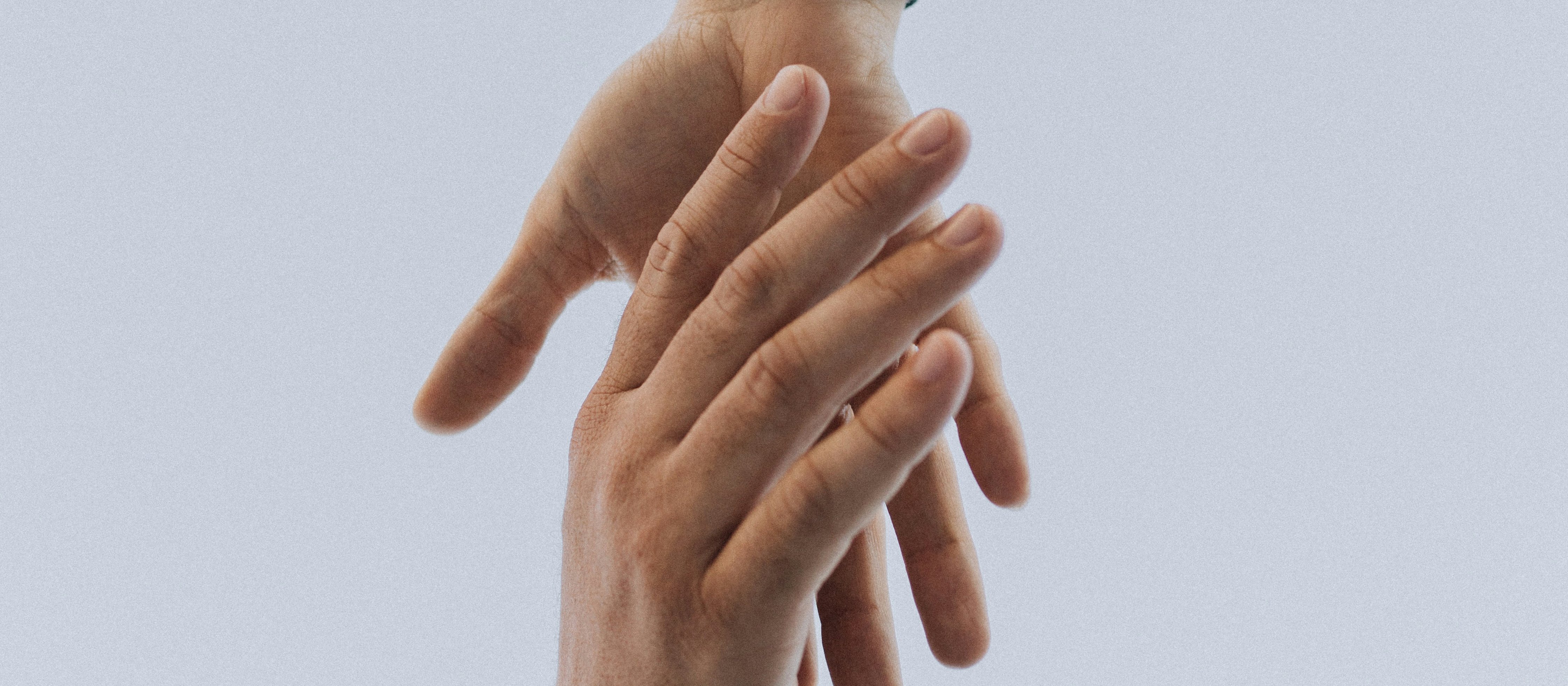 View of two persons hands