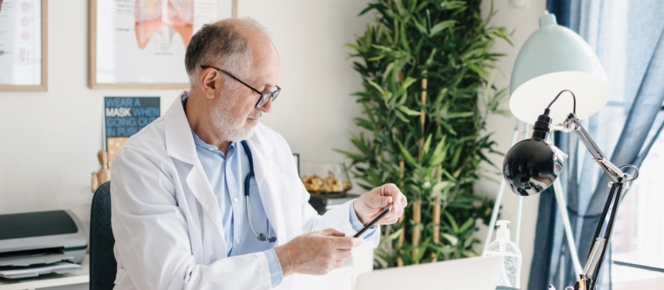 GP at desk CR Anchiy on iStock