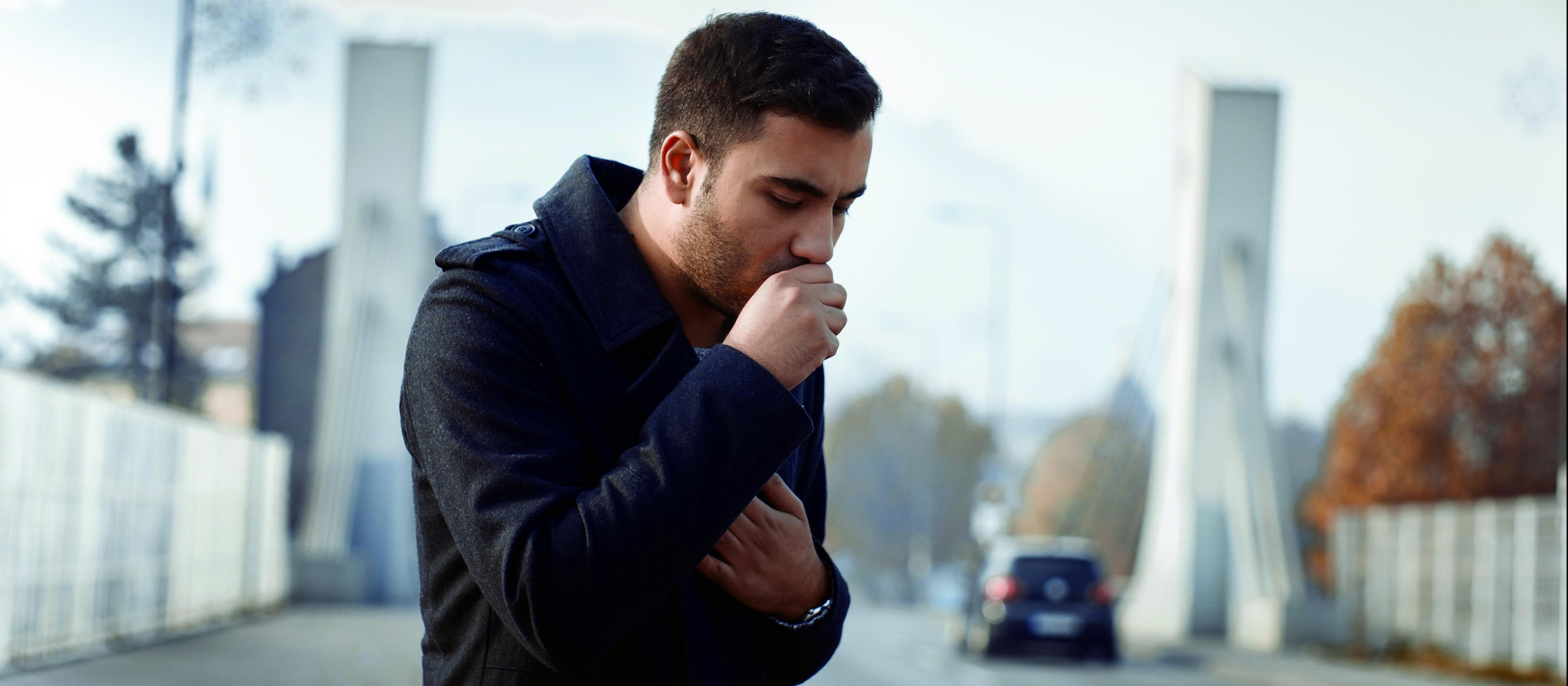 Man coughing