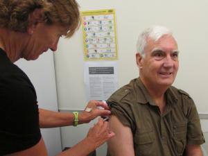 flu vaccine 2019, Kevin Saunders gets his annual influenza immunisation from nurse Kristine Reid [photo: supplied]