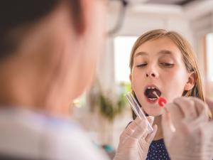 nurse throat swab, teen girl