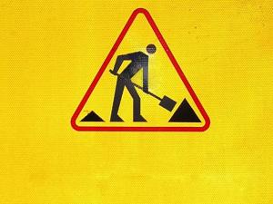 man at work sign