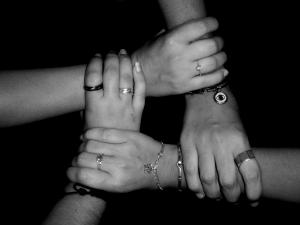 Support group, hands joined