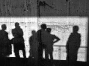 Shadows, people, wall