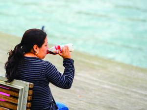 Woman drinking coke