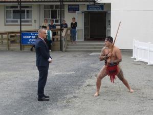 Health minister David Clark accepts the wero (challenge) during the pōwhiri at Bay of Islands Hospital 