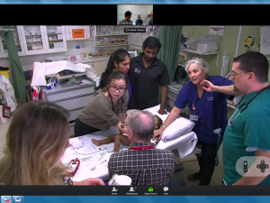 Bay of Islands Hospital clinical team members and Kaikohe GP Justine Woodcock (leftmost in photo) liaise with intensive care specialists and a paediatrician at Whangarei Hospital via Zoom, while treating a seriously ill baby  