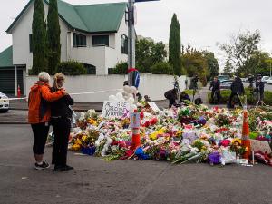 Women leaving flowers for Christchurch mosque shootings victims near the Al Noor Mosque 