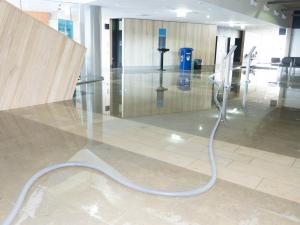 A burst heat pipe in the Outpatient building set off the sprinkler system and flooded the interior.