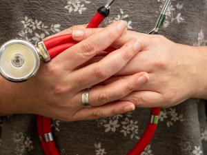 Stethoscope and hands