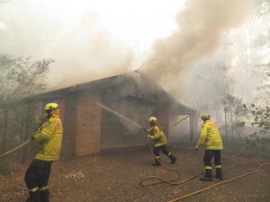 Fire fighters put out bushfire in NSW