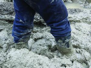 Feet stuck in mud