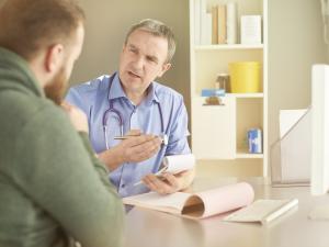 Man consulting with doctor