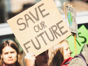 Save Our Future sign - credit Markus Spiske / Unsplash