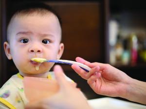 Baby being fed