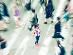 Woman in a crowd, busy