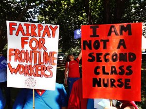 Fair Pay Second Class Placard Strike