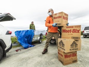 Biodiversity rangers Darren Foxwell, left, and Gus Johnston help distribute Te Pātaka food parcels at Te Awhina Marae in Motueka, and other locations around the top of the south during level 4 lockdown in August last year