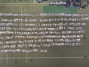 440 students at Wellington College to symbolically represent the worst day for deaths from the 1918 influenza pandemic in NZ – a pandemic that was followed by a valuable official inquiry in 1919 [Image: Luke Pilkinton-Ching, University of Otago]