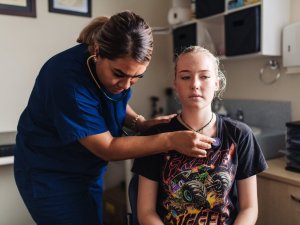 Vanisi Prescott with patient