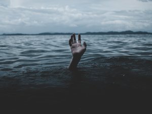 Hand up nearly drowning CR Stormseeker on Unsplash