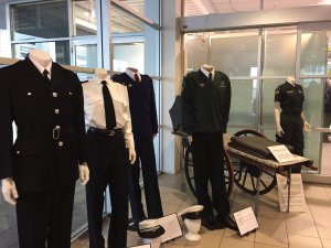 Past and present ambulance officers uniforms