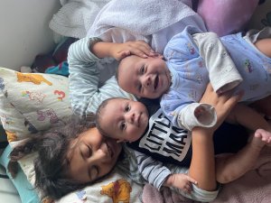 Older sibling Ngakaumahana Caskey Stewart-Pepi with her twin brothers