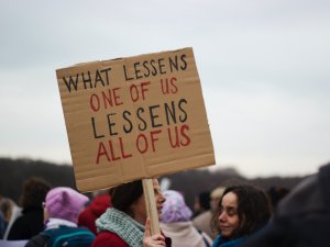 Protest sign [micheile henderson on Unsplash]