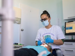 Stevie-Nyx Ruki works on a patient at Cliff Dental in Castlecliff, Whanganui