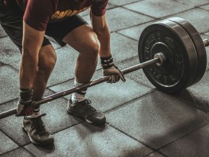 Weights, lifting, man CR Victor Freitas on Unsplash