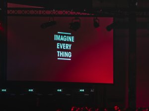 Black monitor displaying Imagine Every Thing CR Alexandre Debieve 