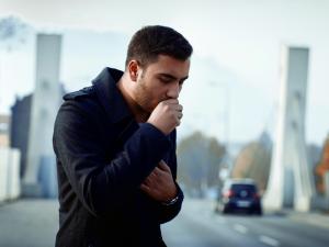 Man coughing